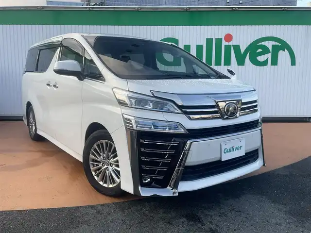 トヨタ ヴェルファイア Z 三重県 2018(平30)年 8.7万km ホワイトパールクリスタルシャイン アルパイン9インチメモリナビ/＊フルセグテレビ/Bluetooth/DVD/CD/AM/FM/バックカメラ/セーフティセンス/パワースライドドア（運転席側/助手席側）/LEDヘッドランプ/オートライト/アルパイン12インチフリップダウンモニター/ボディ同色電動オート格納ドアミラー/235/50R18タイヤ/　＊18インチアルミホイール/左右独立温度調整オートエアコン/ナノイー/スマートエントリー/プッシュスタート