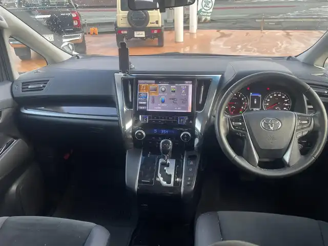 トヨタ ヴェルファイア Z 三重県 2018(平30)年 8.7万km ホワイトパールクリスタルシャイン アルパイン9インチメモリナビ/＊フルセグテレビ/Bluetooth/DVD/CD/AM/FM/バックカメラ/セーフティセンス/パワースライドドア（運転席側/助手席側）/LEDヘッドランプ/オートライト/アルパイン12インチフリップダウンモニター/ボディ同色電動オート格納ドアミラー/235/50R18タイヤ/　＊18インチアルミホイール/左右独立温度調整オートエアコン/ナノイー/スマートエントリー/プッシュスタート