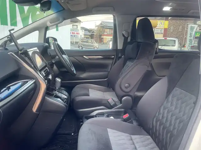 トヨタ ヴェルファイア Z 三重県 2018(平30)年 8.7万km ホワイトパールクリスタルシャイン アルパイン9インチメモリナビ/＊フルセグテレビ/Bluetooth/DVD/CD/AM/FM/バックカメラ/セーフティセンス/パワースライドドア（運転席側/助手席側）/LEDヘッドランプ/オートライト/アルパイン12インチフリップダウンモニター/ボディ同色電動オート格納ドアミラー/235/50R18タイヤ/　＊18インチアルミホイール/左右独立温度調整オートエアコン/ナノイー/スマートエントリー/プッシュスタート