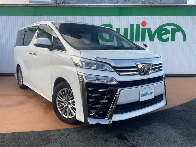 トヨタ ヴェルファイア Z 大分県 2018(平30)年 8.7万km ホワイトパールクリスタルシャイン アルパイン9インチメモリナビ/＊フルセグテレビ/Bluetooth/DVD/CD/AM/FM/バックカメラ/セーフティセンス/パワースライドドア（運転席側/助手席側）/LEDヘッドランプ/オートライト/アルパイン12インチフリップダウンモニター/ボディ同色電動オート格納ドアミラー/235/50R18タイヤ/　＊18インチアルミホイール/左右独立温度調整オートエアコン/ナノイー/スマートエントリー/プッシュスタート