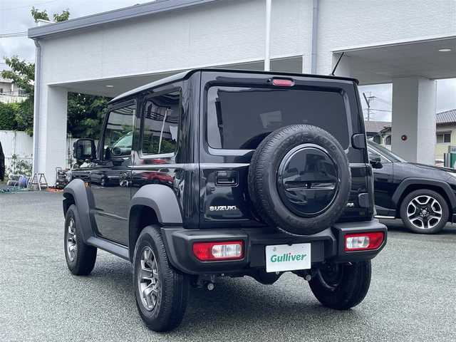 スズキ ジムニー シエラ JC 熊本県 2023(令5)年 1.1万km ブルーイッシュブラックパール3 ワンオーナー/パートタイム4WD/社外8インチナビ/【フルセグTV/CD/DVD/Bluetooth/ラジオ】/バックカメラ/クルーズコントロール/レーダーブレーキサポート/レーンアシスト/ダウンヒルアシスト/アイドリングストップ/横滑り防止機能/前席シートヒーター/純正15インチAW/背面タイヤ/前後ドライブレコーダー（ZDR035）/オートライト/LEDヘッドライト/フォグランプ/純正フロアマット/革巻きステアリング/ステアリングスイッチ/保証書/取扱説明書