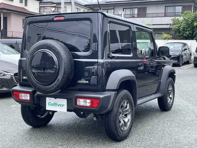 スズキ ジムニー シエラ JC 熊本県 2023(令5)年 1.1万km ブルーイッシュブラックパール3 ワンオーナー/パートタイム4WD/社外8インチナビ/【フルセグTV/CD/DVD/Bluetooth/ラジオ】/バックカメラ/クルーズコントロール/レーダーブレーキサポート/レーンアシスト/ダウンヒルアシスト/アイドリングストップ/横滑り防止機能/前席シートヒーター/純正15インチAW/背面タイヤ/前後ドライブレコーダー（ZDR035）/オートライト/LEDヘッドライト/フォグランプ/純正フロアマット/革巻きステアリング/ステアリングスイッチ/保証書/取扱説明書