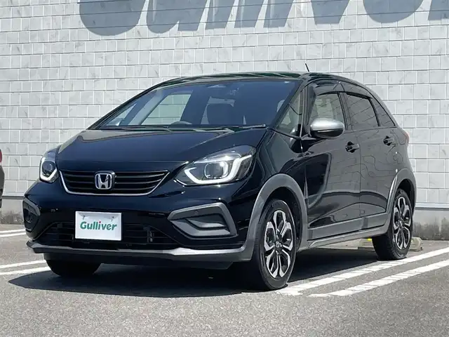 ホンダ フィット e:HEVクロスター 宮崎県 2021(令3)年 5.5万km クリスタルブラックパール 社外SDナビ/（CD/DVD/AM/FM/BT/USB)/フルセグTV/バックカメラ/ステアリングスイッチ/レーダークルーズコントロール/前後ドライブレコーダー/クリアランスソナー/横滑り防止機能/ETC