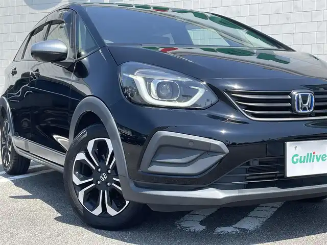 ホンダ フィット e:HEVクロスター 宮崎県 2021(令3)年 5.5万km クリスタルブラックパール 社外SDナビ/（CD/DVD/AM/FM/BT/USB)/フルセグTV/バックカメラ/ステアリングスイッチ/レーダークルーズコントロール/前後ドライブレコーダー/クリアランスソナー/横滑り防止機能/ETC