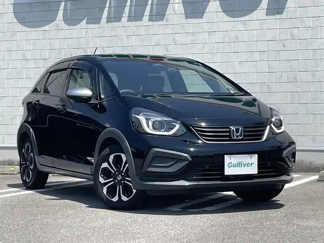ホンダ フィット e:HEVクロスター 宮崎県 2021(令3)年 5.5万km クリスタルブラックパール 社外SDナビ/（CD/DVD/AM/FM/BT/USB)/フルセグTV/バックカメラ/ステアリングスイッチ/レーダークルーズコントロール/前後ドライブレコーダー/クリアランスソナー/横滑り防止機能/ETC