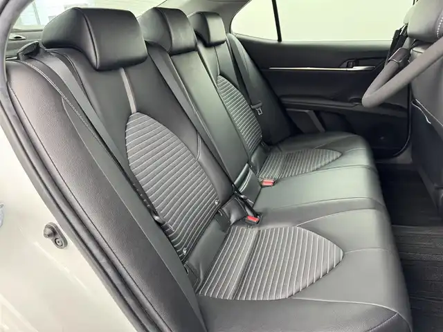 トヨタ カムリ WS 福岡県 2020(令2)年 6.9万km プラチナホワイトパールマイカ 純正ナビ／フルセグＴＶ　/バックカメラ　/レーダー探知機　/ＥＴＣ２．０　/前方ドライブレコーダー　/レーダークルーズコントロール　/コーナーセンサー　/衝突被害軽減ブレーキ　/レーンキープ　/ＢＳＭ　/ＰＫＳＢ　/ハーフレザーシート　/パワーシート　/ＬＥＤヘッドライト