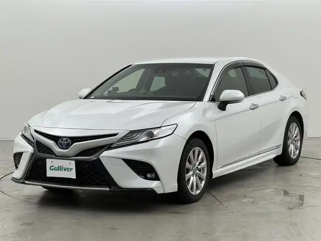 トヨタ カムリ WS 福岡県 2020(令2)年 6.9万km プラチナホワイトパールマイカ 純正ナビ／フルセグＴＶ　/バックカメラ　/レーダー探知機　/ＥＴＣ２．０　/前方ドライブレコーダー　/レーダークルーズコントロール　/コーナーセンサー　/衝突被害軽減ブレーキ　/レーンキープ　/ＢＳＭ　/ＰＫＳＢ　/ハーフレザーシート　/パワーシート　/ＬＥＤヘッドライト