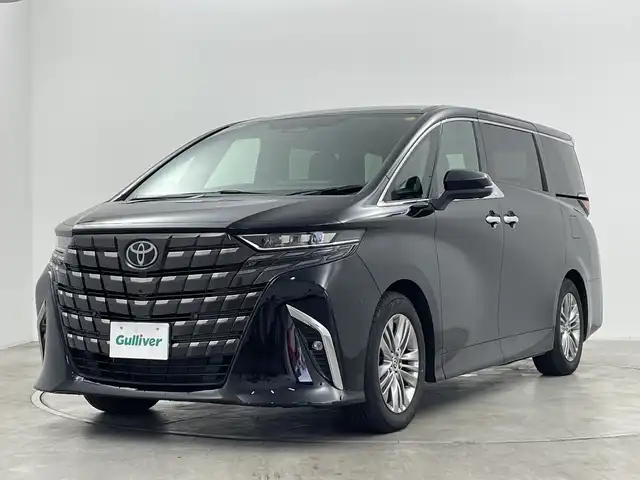 トヨタ アルファードハイブリット Z 群馬県 2025(令7)年 0.5万km ブラック 左右独立ムーンルーフ/トヨタセーフティセンス/PCS/アドバンスドドライブ/PDA/BSM/LDA/レーンチェンジアシスト/FCTA/PKSB/AHB/RSA/RCTA/安心降車アシスト/クリアランスソナー/HUD/純正１４インチナビ/Bluetooth/フルセグTV/AppleCarPlay/純正１２．１型後席モニター/全周囲カメラ/D/Nシートヒーター・エアシート/ハンドルヒーター/D/Nパワーシート/PRゲート/両サイドユニバーサルステップ/オートライト/LEDヘッドランプ・フォグランプ/電格ミラー/ウィンカーミラー/純正AW/ETC2.0/ワイヤレス充電/AC１００V/デジタルインナーミラー/レザーシート/革巻きステアリング/純正フロアマット/プッシュスタート/スマートキー