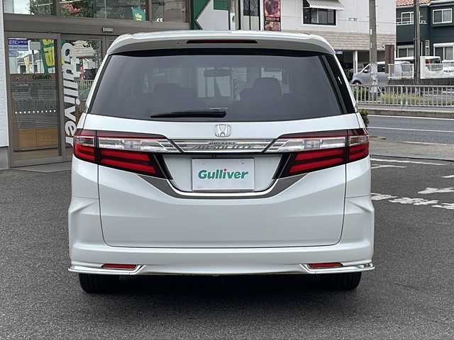ホンダ オデッセイ アブソルート EX 愛知県 2014(平26)年 7.1万km ホワイトオーキッドパール /純正ナビ//フルセグTV・Bluetooth//純正フリップダウンモニター//LEDルームランプ（1～3列目）//LEDアウターウエルカムライト（リアドア〈左右〉）//リア両側パワースライドドア//コンフォートビューパッケージ//トリプルゾーンコントロール・フルオートエアコンディショナー//ブラインドスポットインフォメーション//2列目大型ロールサンシェイド//ABSOLUTE専用18インチアルミホイール（FF）//LEDアクティブコーナリングライト//運転席8ウェイパワーシート//マルチインフォメーション・ディスプレイ//あんしんパッケージ//LEDヘッドライト+導光タイプLEDポジションランプ//フォグライト//大開口フロントグリル（ダーククロームメッキ）//エアロダイナミクス・カラードバンパー（フロント/リア、クロームメッキモール付）//エアロダイナミクス・ドアロアガーニッシュ（クロームメッキ調モール付）//コンビシート（プライムスムース×ファブリック）//本革巻ステアリングホイール//パドルシフト//ABSOLUTE専用チューニングサスペンション//プッシュエンジンスタート//保証書・取扱説明書・スペアキー