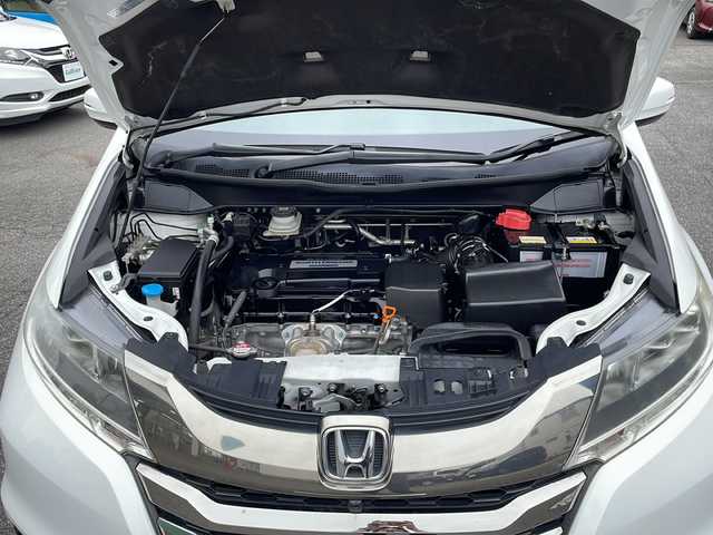 ホンダ オデッセイ アブソルート EX 愛知県 2014(平26)年 7.1万km ホワイトオーキッドパール /純正ナビ//フルセグTV・Bluetooth//純正フリップダウンモニター//LEDルームランプ（1～3列目）//LEDアウターウエルカムライト（リアドア〈左右〉）//リア両側パワースライドドア//コンフォートビューパッケージ//トリプルゾーンコントロール・フルオートエアコンディショナー//ブラインドスポットインフォメーション//2列目大型ロールサンシェイド//ABSOLUTE専用18インチアルミホイール（FF）//LEDアクティブコーナリングライト//運転席8ウェイパワーシート//マルチインフォメーション・ディスプレイ//あんしんパッケージ//LEDヘッドライト+導光タイプLEDポジションランプ//フォグライト//大開口フロントグリル（ダーククロームメッキ）//エアロダイナミクス・カラードバンパー（フロント/リア、クロームメッキモール付）//エアロダイナミクス・ドアロアガーニッシュ（クロームメッキ調モール付）//コンビシート（プライムスムース×ファブリック）//本革巻ステアリングホイール//パドルシフト//ABSOLUTE専用チューニングサスペンション//プッシュエンジンスタート//保証書・取扱説明書・スペアキー