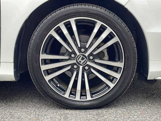 ホンダ オデッセイ アブソルート EX 長野県 2014(平26)年 7.1万km ホワイトオーキッドパール ・純正ナビ/・フルセグTV・Bluetooth/・純正フリップダウンモニター/・LEDルームランプ（1～3列目）/・LEDアウターウエルカムライト（リアドア〈左右〉）/・リア両側パワースライドドア/・コンフォートビューパッケージ/・トリプルゾーンコントロール・フルオートエアコンディショナー/・ブラインドスポットインフォメーション/・2列目大型ロールサンシェイド/・ABSOLUTE専用18インチアルミホイール（FF）/・LEDアクティブコーナリングライト/・運転席8ウェイパワーシート/・マルチインフォメーション・ディスプレイ/・あんしんパッケージ/・LEDヘッドライト+導光タイプLEDポジションランプ/・フォグライト/・大開口フロントグリル（ダーククロームメッキ）/・エアロダイナミクス・カラードバンパー（フロント/リア、クロームメッキモール付）/・エアロダイナミクス・ドアロアガーニッシュ（クロームメッキ調モール付）/・コンビシート（プライムスムース×ファブリック）/・本革巻ステアリングホイール/・パドルシフト/・ABSOLUTE専用チューニングサスペンション/・プッシュエンジンスタート/・保証書・取扱説明書・スペアキー