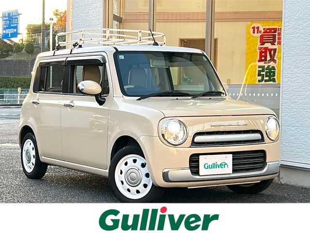 スズキ ラパン ショコラ X 神奈川県 2013(平25)年 5.8万km ミルクティーベージュメタリック/スペリアホワイト ワンオーナー/純正SDナビ/　USB/ワンセグTV/バックカメラ/ルーフラック/ビルトインETC/純正14インチAW/純正フロアマット/オートライト/電動格納ミラー/プッシュスタート/取扱説明書/保証書/スペアキー