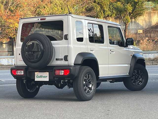 スズキ ジムニー ノマド FC 大阪府 2025(令7)年 0.1千km アークティックホワイトパール /ワンオーナー//登録済未使用車//スズキセーフティサポート/・デュアルカメラブレーキサポート/・衝突被害軽減ブレーキ/・車線逸脱警報システム/・アダプティブクルーズコントロール//LEDヘッドライト//前席シートヒーター//パーキングソナー//アイドリングストップ//本革巻きステアリング//純正15インチアルミホイール//背面タイヤ//ヘッドライトウォッシャー//プッシュスタート//取扱説明書//保証書//スペアキー