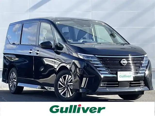 日産 セレナ ハイウェイスター V 佐賀県 2023(令5)年 2.3万km ダイヤモンドブラック プロパイロット/エマージェンシーブレーキ/インテリジェントクルーズコントロール/BSI/BSW/前後ソナー/インテリジェントルームミラー/純正9型SDナビ/・アラウンドビューカメラ/・フルセグTV/BT/HDMI/純正後席モニター/両側パワースライドドア/純正16インチAW/LEDヘッドライト/オートマチックハイビーム/オートライト/フォグランプ/革巻きステアリング/パドルシフト/ETC/電動パーキングスイッチ/社外前方ドラレコ/リアサンシェード/2列目バックテーブル//スペアキー×1/保証書