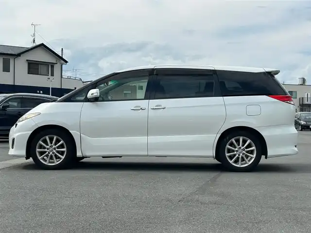 トヨタ エスティマ アエラス Gエディション 静岡県 2011(平23)年 11.6万km ホワイトパールクリスタルシャイン エンジンスタートボタン/パワーステアリング/パワーウィンドウ/スマートキー/オートエアコン/クルーズコントロール/純正ナビ（CD/BT/ワンセグ）/三列シート/オットマン/ドライブレコーダー/ウォークスルー/純正フロアマット/純正アルミホイール/両側パワースライドドア/ABS/オートライト/Wエアバック
