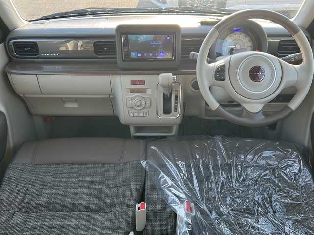 スズキ ラパン ＬＣ X 道東・釧路十勝 2023(令5)年 0.5万km フォーンベージュメタリック/アーバンブラウン 2トーン 純正ディスプレイオーディオ　/ＤＶＤ再生　/Ｂｌｕｅｔｏｏｔｈ接続　/バックカメラ　/前席シートヒーター　/リアコーナーセンサー　/レーンアシスト　/衝突軽減ブレーキ/横滑り防止装置/アイドリングストップ　/スマートキー　/プッシュスタート/純正LEDヘッドライト　/純正１４インチアルミホイール/純正フロアマット