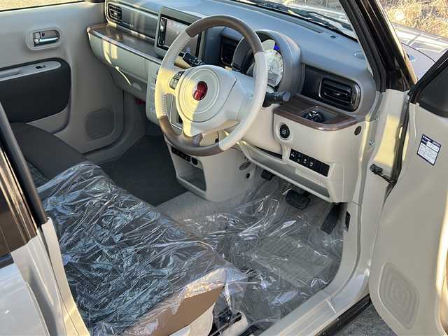 スズキ ラパン ＬＣ X 道東・釧路十勝 2023(令5)年 0.5万km フォーンベージュメタリック/アーバンブラウン 2トーン 純正ディスプレイオーディオ　/ＤＶＤ再生　/Ｂｌｕｅｔｏｏｔｈ接続　/バックカメラ　/前席シートヒーター　/リアコーナーセンサー　/レーンアシスト　/衝突軽減ブレーキ/横滑り防止装置/アイドリングストップ　/スマートキー　/プッシュスタート/純正LEDヘッドライト　/純正１４インチアルミホイール/純正フロアマット