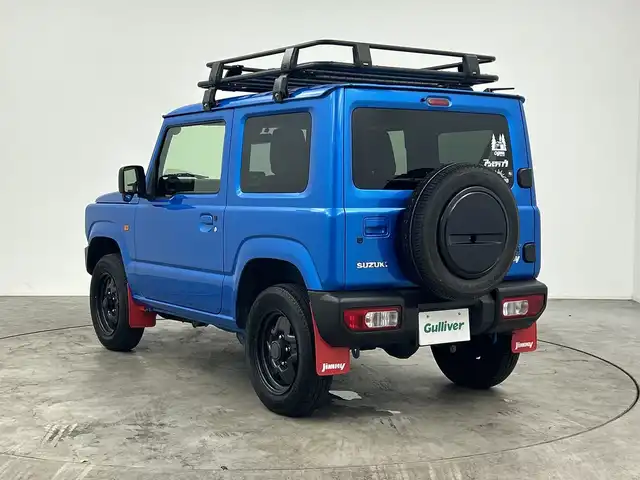 スズキ ジムニー XL 三重県 2021(令3)年 2.5万km ブリスクブルーM 禁煙車/純正SDナビ/（CD/DVD/SD/BT/フルセグTV）/バックカメラ/デュアルセンサーブレーキサポート/レーンキープアシスト/オートハイビーム/ドライブレコーダー/シートヒーター/革調シートカバー/ハーフルーフキャリア/ビルトインETC/スマートキー