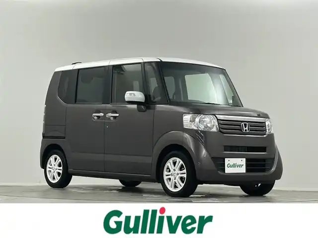 ホンダ Ｎ ＢＯＸ 2トーン G ターボ SSパッケージ 埼玉県 2014(平26)年 1.3万km プレミアムブロンズパール ワンオーナー　純正ナビ　Bカメラ　ビルトインETC　両側パワスラ　クルコン　シートヒーター　HIDオートライト　パドルシフト　純正AW14インチ　スペアキー