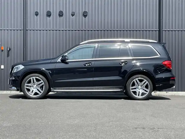 メルセデス・ベンツ ＧＬ５５０ 4MATIC AMGエクスクルーシブ 福島県 2013(平25)年 5.7万km オブシディアンブラック 左ハンドル/ＡＭＧエクスクルーシブパッケージ /・パノラミックスライディングルーフ＆３列目ガラスルーフ/・本革巻ウッドステアリング/・前席シートベンチション/・21インチ・ＡＭＧ５ツインスポークAW/・メルセデスベンツロゴ付ブレーキキャリパー/アダプティブクルーズコントロール/ブラインドスポットモニター/レーンキープアシスト/インテリジェントライト/白レザーシート/前席メモリ付パワーシート/全席シートヒーター/パワーリアゲート/純正HDDナビ(BT/USB/CD/DVD)/フルセグTV/360°カメラ/バックカメラ/ダウンヒルコントロール/サイドステップ/純正エアサスペンション/ルーフレール/ドアバイザー/積み込み冬タイヤ19AW/取扱説明書/保証書