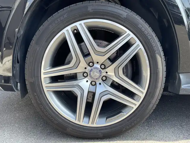 メルセデス・ベンツ ＧＬ５５０ 4MATIC AMGエクスクルーシブ 福島県 2013(平25)年 5.7万km オブシディアンブラック 左ハンドル/ＡＭＧエクスクルーシブパッケージ /・パノラミックスライディングルーフ＆３列目ガラスルーフ/・本革巻ウッドステアリング/・前席シートベンチション/・21インチ・ＡＭＧ５ツインスポークAW/・メルセデスベンツロゴ付ブレーキキャリパー/アダプティブクルーズコントロール/ブラインドスポットモニター/レーンキープアシスト/インテリジェントライト/白レザーシート/前席メモリ付パワーシート/全席シートヒーター/パワーリアゲート/純正HDDナビ(BT/USB/CD/DVD)/フルセグTV/360°カメラ/バックカメラ/ダウンヒルコントロール/サイドステップ/純正エアサスペンション/ルーフレール/ドアバイザー/積み込み冬タイヤ19AW/取扱説明書/保証書