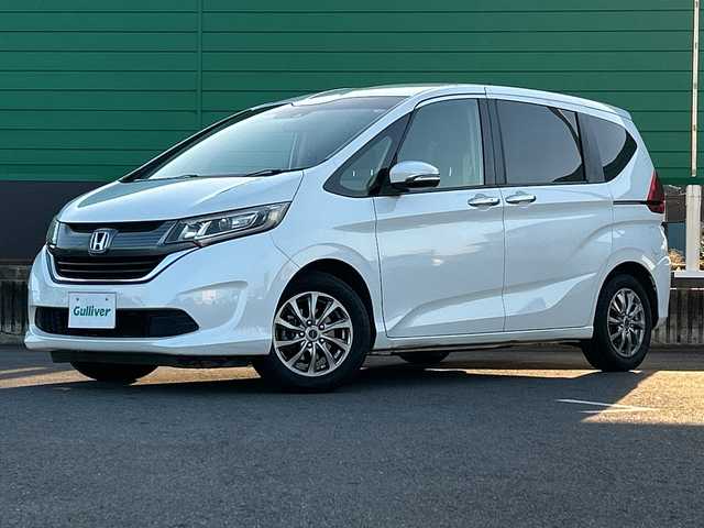 ホンダ フリード G ホンダセンシング 茨城県 2017(平29)年 9.9万km ホワイトオーキッドパール 純正ディスプレイオーディオ/Bluetooth接続/バックカメラ/ビルトインETC/アイドリングストップ/クルーズコントロール/ウォークスルー/両側パワースライドドア/横滑り防止装置/レーン逸脱警報/衝突軽減システム/オートライト/LEDヘッドライト/純正フロアマット/純正15インチアルミホイール/スマートキー/保証書/取扱説明書/記録簿/（左電動格納ミラー異音）