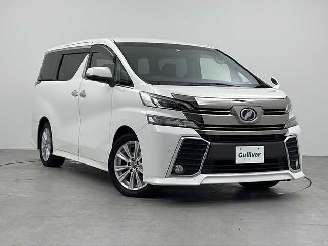 トヨタ ヴェルファイア Z Aエディション 三重県 2015(平27)年 9万km ホワイトパールクリスタルシャイン 禁煙車/衝突軽減/レーダークルーズコントロール/純正９型ナビ（NSZT-Y64T）/・フルセグ/・CD/DVD/・SD音楽録音/・Bluetooth/バックカメラ/フリップダウンモニター/電動パーキングブレーキ/ブレーキホールド/両側パワースライドドア/ＡＣ１００Ｗ１００Ｖ電源/コーナーセンサー　/革巻きステアリング/オートライト/ＬＥＤライト/フォグランプ/ＥＴＣ