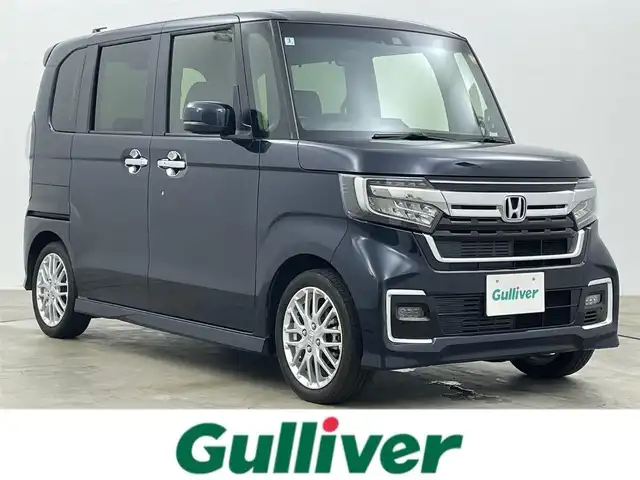 ホンダ Ｎ ＢＯＸ カスタム L ターボ 岡山県 2022(令4)年 2.4万km ミッドナイトブルービームM ワンオーナー/純正8インチナビ/（Bluetooth/フルセグ/CD/DVD/Carplay）/両側電動スライドドア/レーダークルーズコントロール/前席シートヒーター/ETC/バックカメラ/前後ドライブレコーダー/パドルシフト/ハーフレザー/コーナーセンサー/スマートキー/スペアキー×1/純正フロアマット/純正AW/取扱説明書/保証書