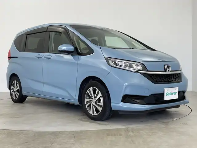 ホンダ フリード G ホンダセンシング 鹿児島県 2021(令3)年 3.7万km シーグラスブルーパール ワンオーナー/社外ディスプレイオーディオ/バックカメラ/LEDヘッドライト/両側パワースライドドア/前席シートヒーター/ETC/ホンダセンシング/衝突軽減ブレーキ/車線維持支援システム/誤発進抑制機能/標識認識機能/ブラインドスポット/車両取扱説明書/保証書