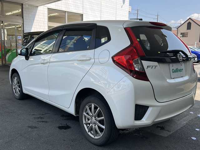 ホンダ フィット 13G Fパッケージ 栃木県 2014(平26)年 8.8万km プレミアムホワイトパール 社外ナビ/(ECLIPSE　AVN133M)/ワンセグTV/CD/FM/AM/電格ウィンカーミラー/ETC/ドライブレコーダー/(コムテック　HDR103)/ドアバイザー/フロアマット/禁煙車/取説