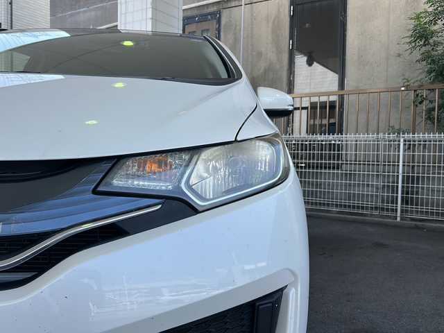 ホンダ フィット 13G Fパッケージ 栃木県 2014(平26)年 8.8万km プレミアムホワイトパール 社外ナビ/(ECLIPSE　AVN133M)/ワンセグTV/CD/FM/AM/電格ウィンカーミラー/ETC/ドライブレコーダー/(コムテック　HDR103)/ドアバイザー/フロアマット/禁煙車/取説