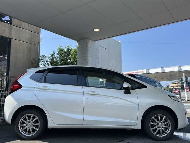 ホンダ フィット 13G Fパッケージ 栃木県 2014(平26)年 8.8万km プレミアムホワイトパール 社外ナビ/(ECLIPSE　AVN133M)/ワンセグTV/CD/FM/AM/電格ウィンカーミラー/ETC/ドライブレコーダー/(コムテック　HDR103)/ドアバイザー/フロアマット/禁煙車/取説