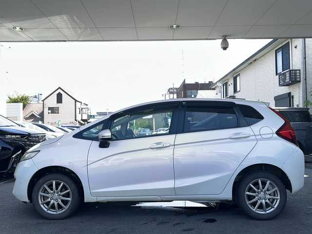 ホンダ フィット 13G Fパッケージ 栃木県 2014(平26)年 8.8万km プレミアムホワイトパール 社外ナビ/(ECLIPSE　AVN133M)/ワンセグTV/CD/FM/AM/電格ウィンカーミラー/ETC/ドライブレコーダー/(コムテック　HDR103)/ドアバイザー/フロアマット/禁煙車/取説