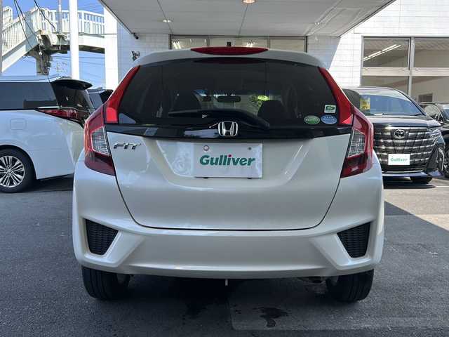 ホンダ フィット 13G Fパッケージ 栃木県 2014(平26)年 8.8万km プレミアムホワイトパール 社外ナビ/(ECLIPSE　AVN133M)/ワンセグTV/CD/FM/AM/電格ウィンカーミラー/ETC/ドライブレコーダー/(コムテック　HDR103)/ドアバイザー/フロアマット/禁煙車/取説