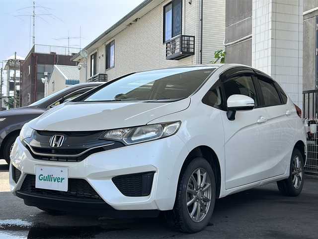 ホンダ フィット 13G Fパッケージ 栃木県 2014(平26)年 8.8万km プレミアムホワイトパール 社外ナビ/(ECLIPSE　AVN133M)/ワンセグTV/CD/FM/AM/電格ウィンカーミラー/ETC/ドライブレコーダー/(コムテック　HDR103)/ドアバイザー/フロアマット/禁煙車/取説