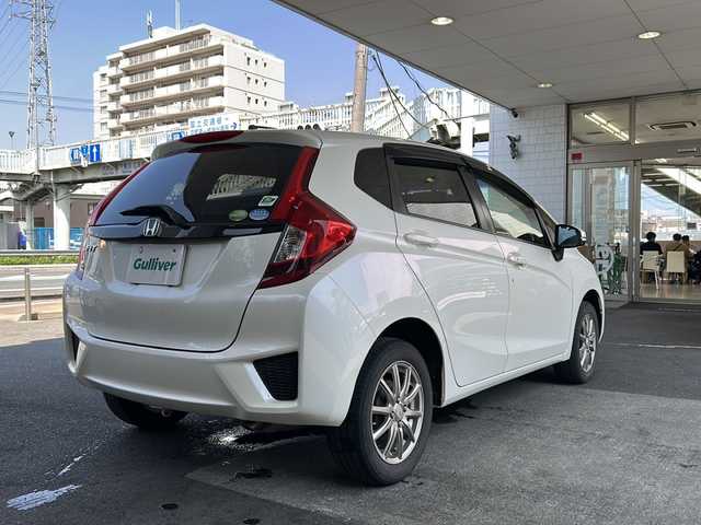 ホンダ フィット 13G Fパッケージ 栃木県 2014(平26)年 8.8万km プレミアムホワイトパール 社外ナビ/(ECLIPSE　AVN133M)/ワンセグTV/CD/FM/AM/電格ウィンカーミラー/ETC/ドライブレコーダー/(コムテック　HDR103)/ドアバイザー/フロアマット/禁煙車/取説