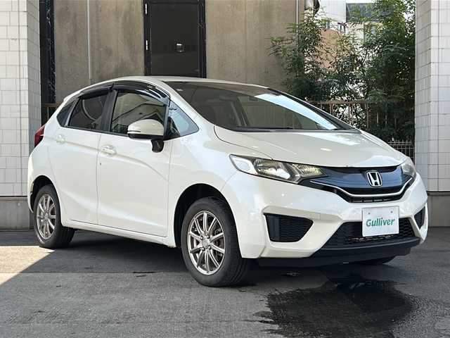 ホンダ フィット 13G Fパッケージ 栃木県 2014(平26)年 8.8万km プレミアムホワイトパール 社外ナビ/(ECLIPSE　AVN133M)/ワンセグTV/CD/FM/AM/電格ウィンカーミラー/ETC/ドライブレコーダー/(コムテック　HDR103)/ドアバイザー/フロアマット/禁煙車/取説