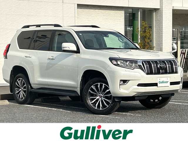 トヨタ ランドクルーザー プラド TX Lパッケージ 千葉県 2019(平31)年 5.8万km ホワイトパールクリスタルシャイン ワンオーナー　９型ナビ　バックカメラ　ＥＴＣ　クルコン　ドラレコ　フルセグ　Ｂｔ　ＤＶＤ　電動エアシート・ヒーター　ウッド調コンビハンドル　ＰＣＳ　ＡＨＢ　ＬＥＤライト　レーンアシスト　１９インチＡＷ