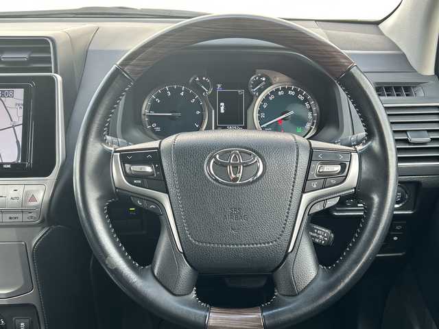 トヨタ ランドクルーザー プラド TX Lパッケージ 千葉県 2019(平31)年 5.8万km ホワイトパールクリスタルシャイン ワンオーナー　９型ナビ　バックカメラ　ＥＴＣ　クルコン　ドラレコ　フルセグ　Ｂｔ　ＤＶＤ　電動エアシート・ヒーター　ウッド調コンビハンドル　ＰＣＳ　ＡＨＢ　ＬＥＤライト　レーンアシスト　１９インチＡＷ