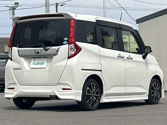 トヨタ ルーミー カスタムG 道北・旭川 2017(平29)年 5.6万km パールホワイトⅢ スマートキー/モデリスタフルエアロ/社外１５インンチアルミ/純正エンジンスターター/クルーズコントロール/社外メモリーナビAVIC-RW800/  ＣＤ・ＤＶＤ・フルセグ・ＢＴ・Ｄレコ/社外前後ドライブレコーダー/ステアリングリモコン/前席シートヒーター/社外シートカバー/LEDオートライト・フォグ/両側パワースライドドア/電動格納オートドアミラー/バックカメラ/ETC/新車時保証書・取説