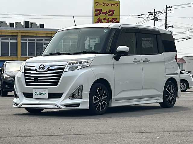 トヨタ ルーミー カスタムG 道北・旭川 2017(平29)年 5.6万km パールホワイトⅢ スマートキー/モデリスタフルエアロ/社外１５インンチアルミ/純正エンジンスターター/クルーズコントロール/社外メモリーナビAVIC-RW800/  ＣＤ・ＤＶＤ・フルセグ・ＢＴ・Ｄレコ/社外前後ドライブレコーダー/ステアリングリモコン/前席シートヒーター/社外シートカバー/LEDオートライト・フォグ/両側パワースライドドア/電動格納オートドアミラー/バックカメラ/ETC/新車時保証書・取説