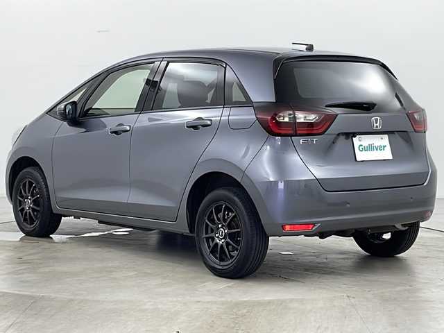 ホンダ フィット ベーシック 道央・札幌 2021(令3)年 7万km シャイニンググレーM ・4WD/・寒冷地仕様/・社外SDナビ（MDV-D308BT）/・BT&CD&DVD/・ホンダセンシング/・デジタルインナーミラー型ドラレコ前後/・クルーズコントロール/・ミラーヒーター/・ETC/・パーキングセンサー/・オートマチックハイビーム/・オートライト/・ヘッドライトレベライザー/・プッシュスタート/・スマートキー/・スペアキー1本/・積込スタッドレス/・取扱説明書