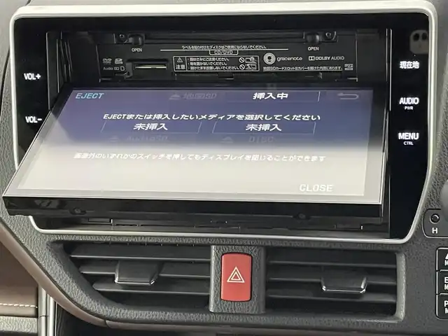トヨタ エスクァイア ハイブリッド Gi プレミアムパッケージ 千葉県 2018(平30)年 6.5万km アバンギャルドブロンズメタリック 純正１０型ナビ/（AM＆FM＆Bluetooth＆フルセグTV＆CD＆DVD）/両側電動スライドドア/衝突軽減ブレーキ　/トヨタセーフティセンス　/ハンドルヒーター　/シートヒーター　/クルーズコントロール　/ビルトインＥＴＣ２．０　/前後コーナーセンサー　/バックカメラ/リアエアコン/アイドリングストップ/ウィンカーミラー/ドアバイザー/プッシュスタート/リアサンシェード/USBポート/LEDヘッドライト（オートライト付き）/電動格納サイドミラー