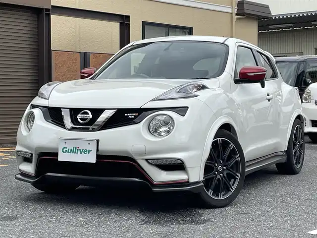 日産 ジューク ニスモ RS 千葉県 2015(平27)年 5.3万km ブリリアントホワイトパール 純正ディーラーナビ(AM/FM/BT/フルセグ/USB)/前方ドライブレコーダー/2WD⇔4WDの切り替え/セーフティーパック(盗難防止機能付き)/カロッチェリアウーハー付き/ビルトインETC/パドルシフト/横滑り防止機能/純正ニスモレカロセミバケットシート/tanabeタワーバー/オートライト/HIDヘッドライト/純正フロアマット/ウィンカーミラー/シガーソケット