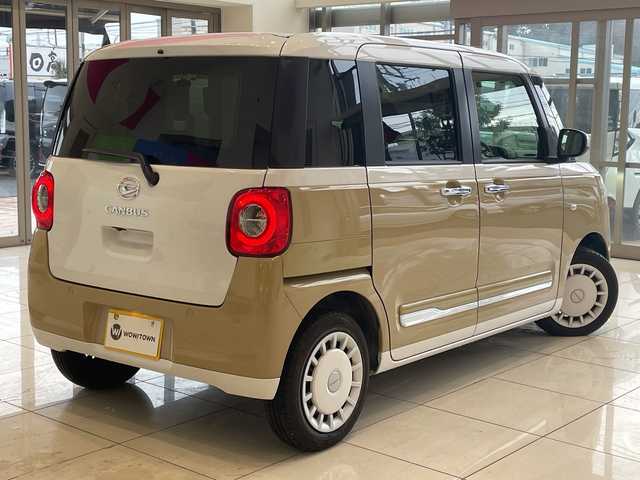 ダイハツ ムーヴ キャンバス ストライプス G 埼玉県 2023(令5)年 0.5万km シャイニングホワイトパール/サンドベージュメタリック スマートアシスト/純正9インチディスプレイオーディオ/　　BT/USB/CarPlay/バックカメラ/両側パワースライドドア/LEDオートライト/シートヒーター/コーナーセンサー/ステアリングスイッチ