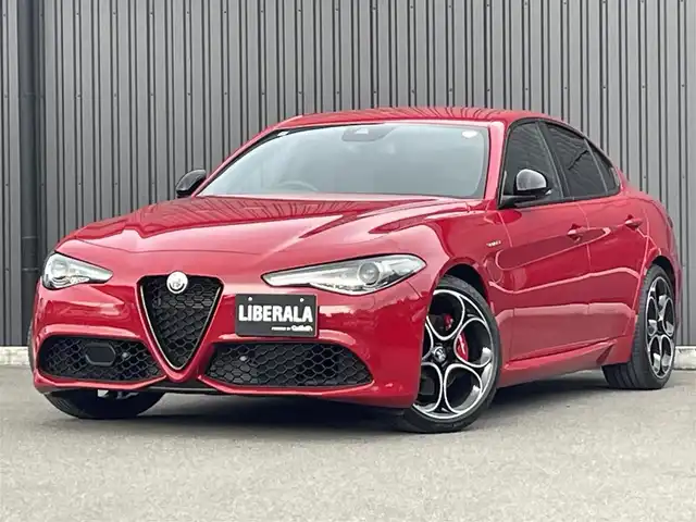 アルファロメオ ジュリア ヴェローチェ 福島県 2022(令4)年 0.2万km 赤 純正ナビ(BT/USB/AUX)/フルセグTV/バックカメラ/ステアリングスイッチ/ステアリングヒーター/黒レザーシート/パワーシート/シートヒーター/ワイアレスチャージャー/純正19AW/純正フロアマット/保証書/取扱説明書/スペアキー
