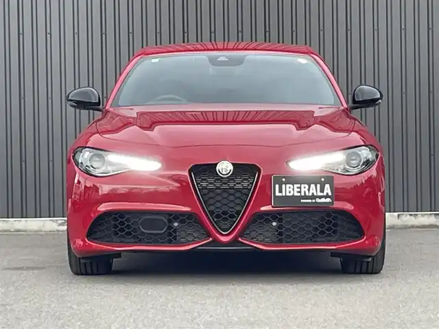 アルファロメオ ジュリア ヴェローチェ 福島県 2022(令4)年 0.2万km 赤 純正ナビ(BT/USB/AUX)/フルセグTV/バックカメラ/ステアリングスイッチ/ステアリングヒーター/黒レザーシート/パワーシート/シートヒーター/ワイアレスチャージャー/純正19AW/純正フロアマット/保証書/取扱説明書/スペアキー