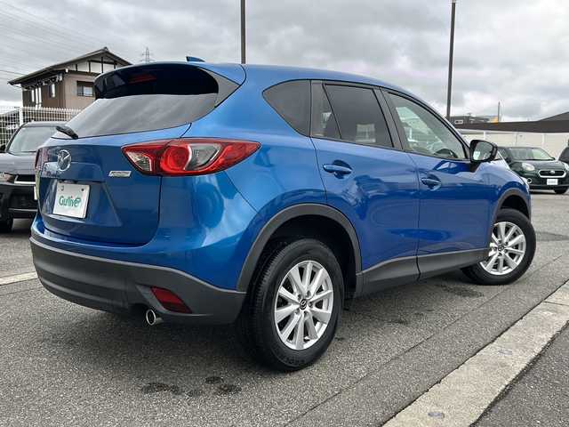 マツダ ＣＸ－５ XD 富山県 2012(平24)年 14.5万km スカイブルーマイカ ワンオーナー/スマートキー×２/社外HDDナビ（CN-S310D)/DVD/BT/MSV/フルセグTV/バックカメラ/左サイドカメラ/ETC/衝突安全ブレーキ/AFS/TCS/RVM/クルーズコントロール/プッシュスタート/ステアリングスイッチ/電動格納ミラー/アイドリングストップ/ドライブレコーダー/リアスポイラー/皮巻きステアリング/純正１７インチAW/ISOFIX対応/フォグランプ/保証書・取説・ナビ取説