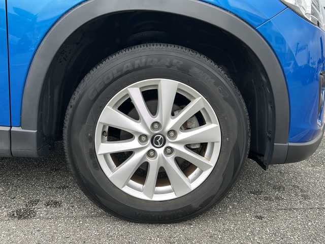 マツダ ＣＸ－５ XD 富山県 2012(平24)年 14.5万km スカイブルーマイカ ワンオーナー/スマートキー×２/社外HDDナビ（CN-S310D)/DVD/BT/MSV/フルセグTV/バックカメラ/左サイドカメラ/ETC/衝突安全ブレーキ/AFS/TCS/RVM/クルーズコントロール/プッシュスタート/ステアリングスイッチ/電動格納ミラー/アイドリングストップ/ドライブレコーダー/リアスポイラー/皮巻きステアリング/純正１７インチAW/ISOFIX対応/フォグランプ/保証書・取説・ナビ取説