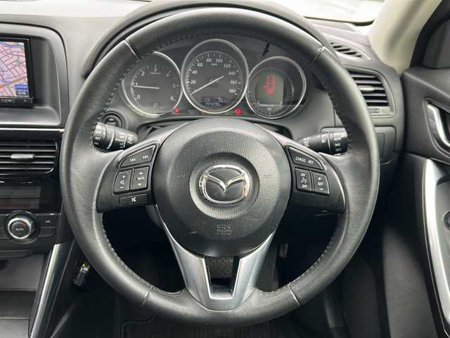 マツダ ＣＸ－５ XD 富山県 2012(平24)年 14.5万km スカイブルーマイカ ワンオーナー/スマートキー×２/社外HDDナビ（CN-S310D)/DVD/BT/MSV/フルセグTV/バックカメラ/左サイドカメラ/ETC/衝突安全ブレーキ/AFS/TCS/RVM/クルーズコントロール/プッシュスタート/ステアリングスイッチ/電動格納ミラー/アイドリングストップ/ドライブレコーダー/リアスポイラー/皮巻きステアリング/純正１７インチAW/ISOFIX対応/フォグランプ/保証書・取説・ナビ取説